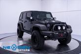 Thumbnail of 2011 Black Clearcoat Jeep Wrangler Unlimited
