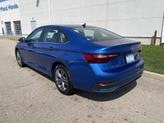 Thumbnail of 2024 Rising Blue Metallic Volkswagen Jetta