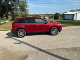 Thumbnail of 2013 Maroon Ford Edge
