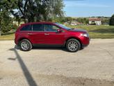 Thumbnail of 2013 Maroon Ford Edge