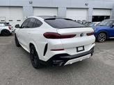 Thumbnail of 2024 Carbon Black Metallic BMW X6