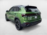 Thumbnail of 2025 Bright Moss Green Metallic/Deep Black Roof Volkswagen Taos