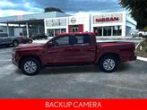 Thumbnail of 2024 Cardinal Red Metallic Nissan Frontier