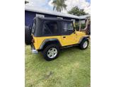 Thumbnail of 2000 Yellow Jeep Wrangler