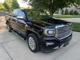 Photo of 2016 Black GMC Sierra 1500