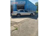 Thumbnail of 2000 Gold Lincoln Town Car