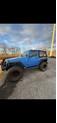 Thumbnail of 2015 Blue Jeep Wrangler