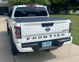 Thumbnail of 2024 White Nissan Frontier