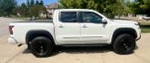 Thumbnail of 2024 White Nissan Frontier