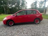 Thumbnail of 2007 Red Nissan Versa