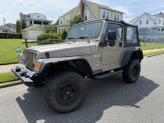 Photo of 2004 Beige Jeep Wrangler