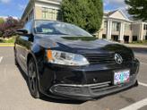Thumbnail of 2012 Black Volkswagen Jetta