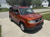 Thumbnail of 2011 Orange Honda Element