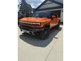 Photo of 2024 Orange GMC HUMMER EV Pickup