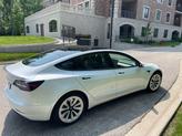 Photo of 2021 White Tesla Model 3