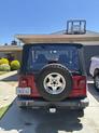 Thumbnail of 2001 Red Jeep Wrangler