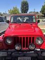 Photo of 2001 Red Jeep Wrangler