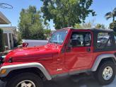 Thumbnail of 2001 Red Jeep Wrangler