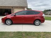 Photo of 2013 Red Toyota Prius v