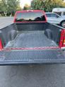 Thumbnail of 1999 Red GMC Sierra 1500