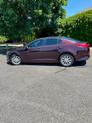 Photo of 2015 Red Kia Optima