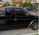 Thumbnail of 1996 Black Nissan Pickup Truck