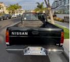 Thumbnail of 1996 Black Nissan Pickup Truck
