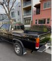 Thumbnail of 1996 Black Nissan Pickup Truck