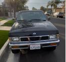 Thumbnail of 1996 Black Nissan Pickup Truck