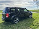Photo of 2015 Black Honda Pilot