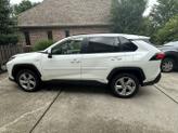 Photo of 2021 White Toyota RAV4 Hybrid
