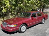 Photo of 1997 Red Lincoln Town Car