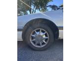 Thumbnail of 1996 White Cadillac Seville