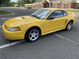 Thumbnail of 1999 Yellow Ford Mustang