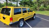 Thumbnail of 2001 Yellow Jeep Cherokee