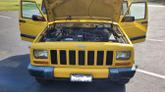 Thumbnail of 2001 Yellow Jeep Cherokee
