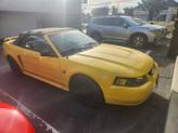 Photo of 2004 Yellow Ford Mustang