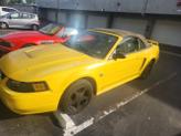 Thumbnail of 2004 Yellow Ford Mustang