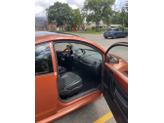 Thumbnail of 2010 Orange Volkswagen New Beetle