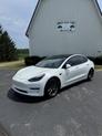 Photo of 2021 White Tesla Model 3