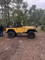 Thumbnail of 2002 Yellow Jeep Wrangler
