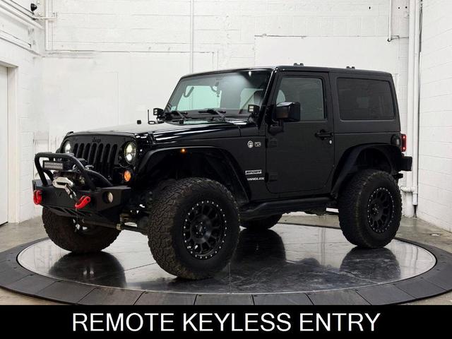 Photo of 2016 Black Clearcoat Jeep Wrangler