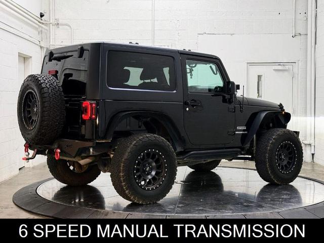 Photo of 2016 Black Clearcoat Jeep Wrangler