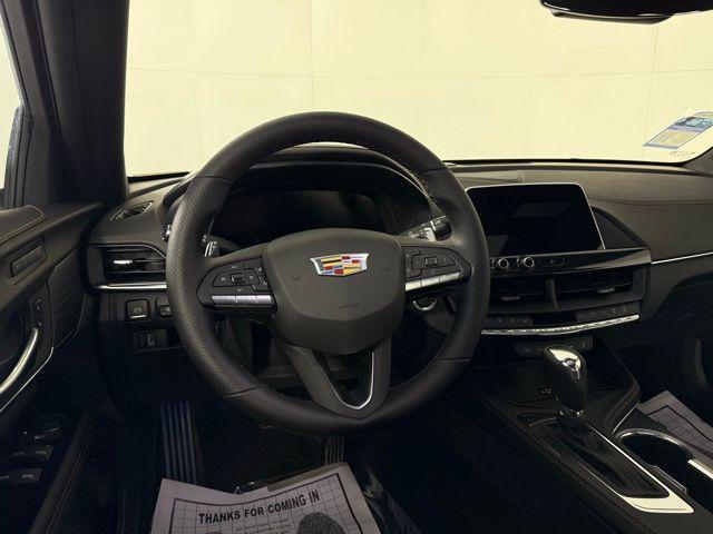 Photo of 2025 Summit White Cadillac CT4