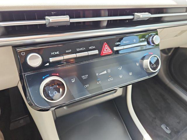 Photo of 2025 Ash Black Hyundai TUCSON Hybrid