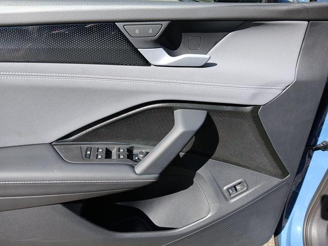Photo of 2025 Monterey Blue W/Black Roof Volkswagen Tiguan