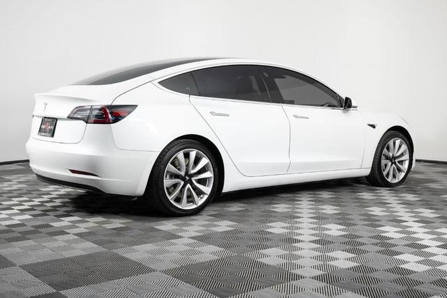 Photo of 2018 Pearl White Multi Tesla Model 3