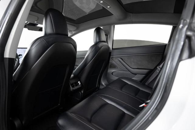 Photo of 2018 Pearl White Multi Tesla Model 3