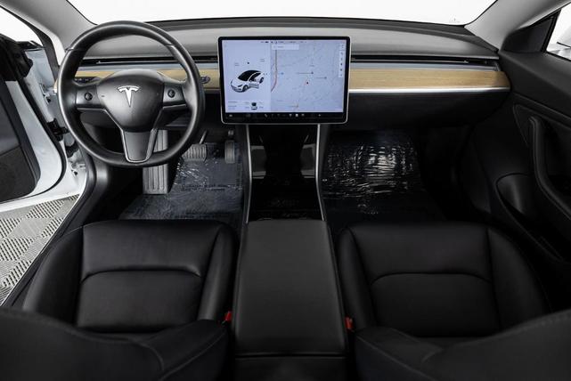 Photo of 2018 Pearl White Multi Tesla Model 3