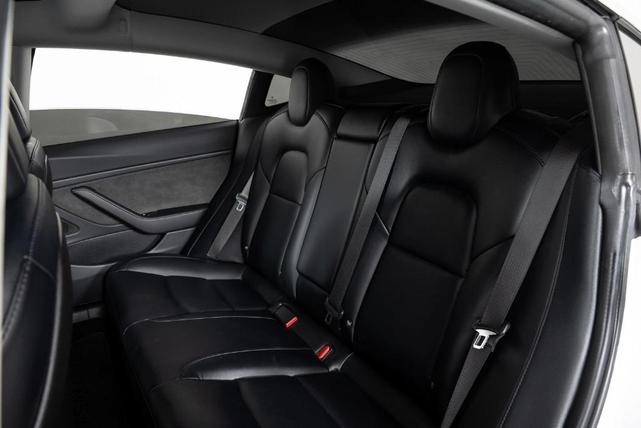 Photo of 2018 Pearl White Multi Tesla Model 3